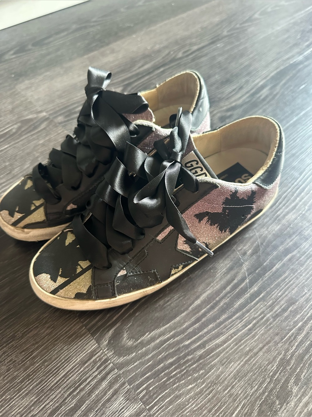 Light purple / green golden goose sneakers.